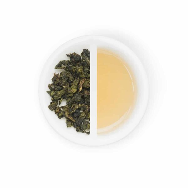 Milky oolong tea leaves on the left tea of milky oolong on the right